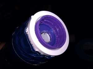 Glue bottle cap in threaded end of adapter