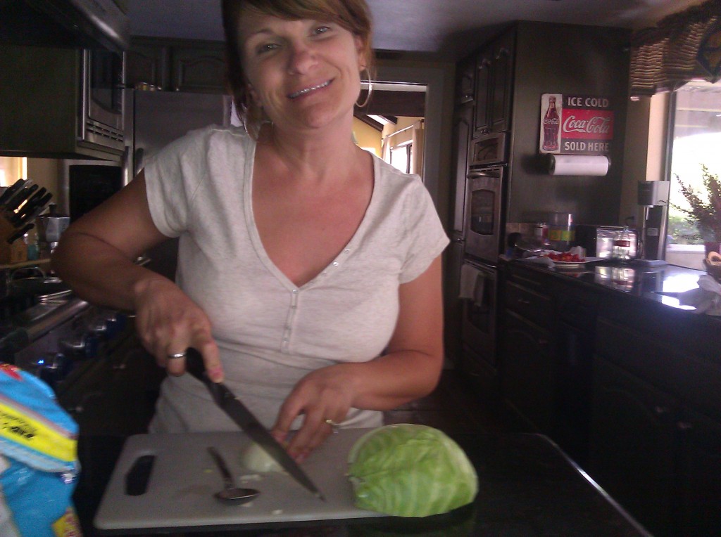 This is me---cooking dinner while my daughter is doing her kitchen mixing! (She took the picture!)